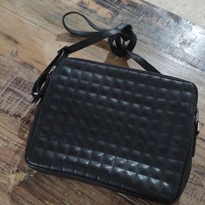 Black quilted leather crossbody purse with silver